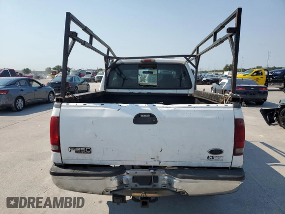 2001 Ford Super Duty F-250 XL with VIN 1FTNX20L01EC17379, listed as a Copart auction lot 74730024 with 309,556 mi miles and Salvage Title. Bid and sale history available at carsss.com. Image 6.