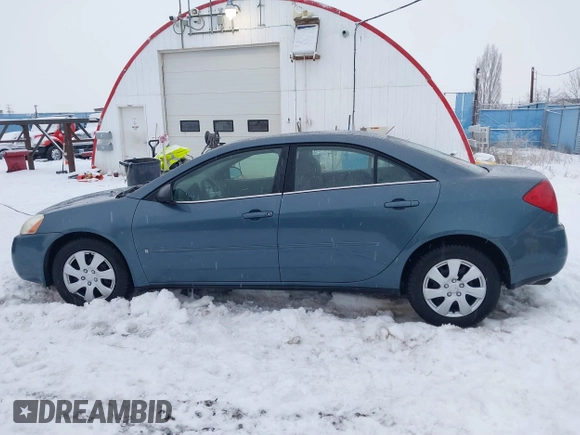 2006 Pontiac G6 6-Cyl with VIN 1G2ZG558564220089, listed as a IAAI auction lot 41282549 with 173,034 mi miles. Bid and sale history available at carsss.com. Image 14.