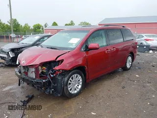 2015 Toyota Sienna XLE with VIN 5TDYK3DC9FS569714, listed as a IAAI auction lot 42297410 with 114,802 mi miles and . Bid and sale history available at DreamBid. Image 18.