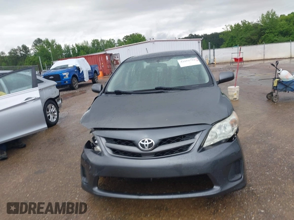 2011 Toyota Corolla L with VIN JTDBU4EE3B9140115, listed as a IAAI auction lot 42052792 with 143,646 mi miles and . Bid and sale history available at DreamBid. Image 12.