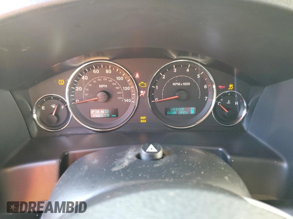 2006 Jeep Commander with VIN 1J8HH48N96C212639, listed as a Copart auction lot 73800324 with 140,579 mi miles and Salvage Title. Bid and sale history available at carsss.com. Image 9.