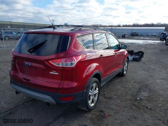 2013 Ford Escape SE with VIN 1FMCU0GX1DUA98986, listed as a IAAI auction lot 41858744 with 105,440 mi miles. Bid and sale history available at carsss.com. Image 4.