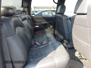 2002 GMC Sierra 1500HD SLE z VIN 1GTGC13U12F134493, wystawiony jako IAAI lot #40392044 z przebiegiem 157 996 mil mil oraz . Historia ofert i sprzedaży dostępna na DreamBid. Obrazek 8.