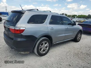 2013 Dodge Durango Crew z VIN 1C4RDJDGXDC696119, wystawiony jako Copart lot #58226905 z przebiegiem 154 915 mil mil oraz Czysty tytuł • Clean title. Historia ofert i sprzedaży dostępna na DreamBid. Obrazek 3.