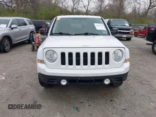 2014 Jeep Patriot Sport with VIN 1C4NJRBB1ED744101, listed as a IAAI auction lot 42009390 with 180,214 mi miles. Bid and sale history available at carsss.com. Image 13.