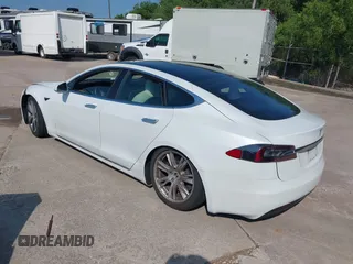2020 Tesla Model S Long Range with VIN 5YJSA1E29LF389023, listed as a IAAI auction lot 42509364 with 93,070 mi miles and . Bid and sale history available at DreamBid. Image 3.