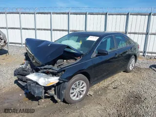 2016 Toyota Camry XLE with VIN 4T1BF1FK2GU196740, listed as a IAAI auction lot 41671781 with 164,850 mi miles. Bid and sale history available at carsss.com. Image 6.