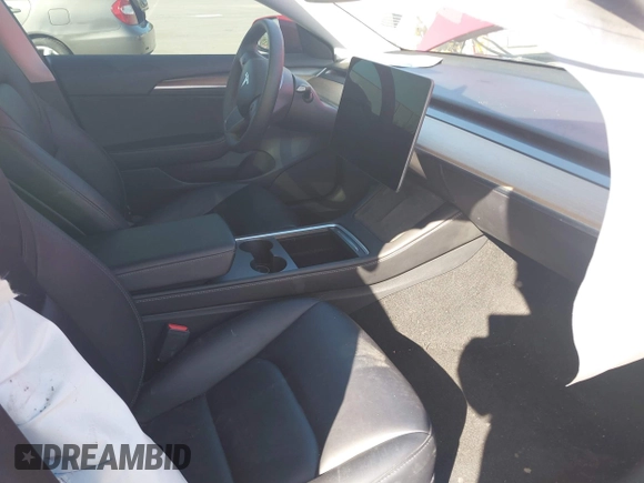 2023 Tesla Model 3 with VIN 5YJ3E1EA1PF385490, listed as a IAAI auction lot 42315884 with 17,590 mi miles and . Bid and sale history available at DreamBid. Image 5.