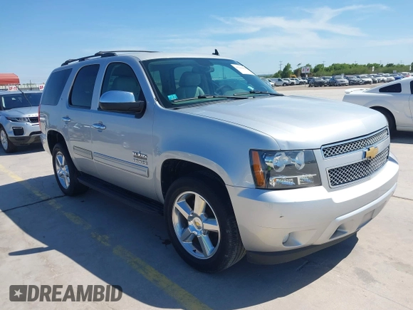2013 Chevrolet Tahoe LT with VIN 1GNSCBE07DR164486, listed as a IAAI auction lot 42216421 with 220,395 mi miles and . Bid and sale history available at DreamBid. Image 1.