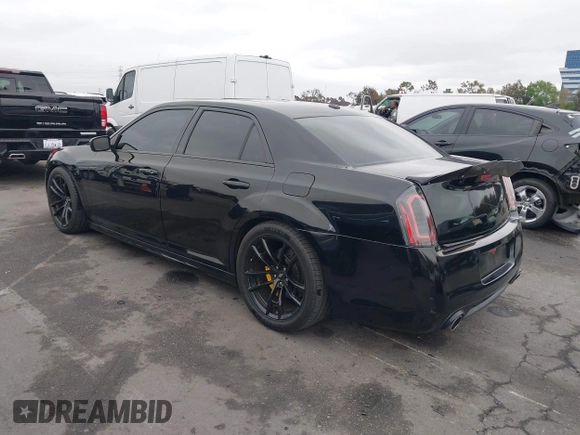 2013 Chrysler 300 SRT-8 with VIN 2C3CCAFJ9DH576184, listed as a IAAI auction lot 42162364 with 104,021 mi miles and . Bid and sale history available at carsss.com. Image 3.