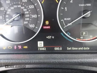 2015 BMW 3 Series 328i with VIN WBA3A5C58FF610035, listed as a IAAI auction lot 40986949 with 73,083 mi miles. Bid and sale history available at carsss.com. Image 7.
