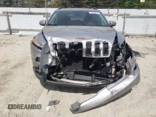 2016 Jeep Cherokee 75th Anniversary with VIN 1C4PJLCB5GW256619, listed as a Copart auction lot 53648575 with 98,969 mi miles and Salvage Title. Bid and sale history available at DreamBid. Image 5.