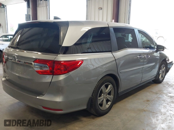 2018 Honda Odyssey EX-L z VIN 5FNRL6H70JB059653, wystawiony jako IAAI lot #42324330 z przebiegiem 115 623 mil mil oraz . Historia ofert i sprzedaży dostępna na DreamBid. Obrazek 4.