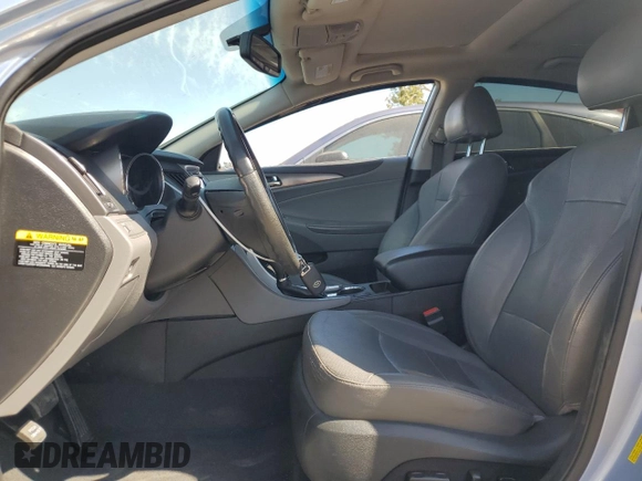 2012 Hyundai Sonata Hybrid with VIN KMHEC4A4XCA040859, listed as a Copart auction lot 63808295 with 110,339 mi miles and Salvage title. Bid and sale history available at DreamBid. Image 7.