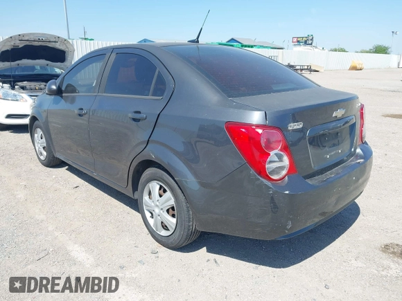 2013 Chevrolet Sonic LS with VIN 1G1JA5SH2D4112064, listed as a IAAI auction lot 42043168 with 215,480 mi miles and . Bid and sale history available at DreamBid. Image 3.