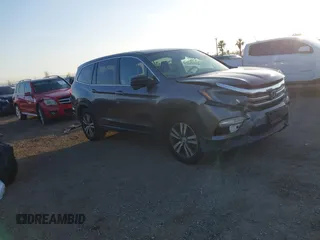 2017 Honda Pilot EX-L z VIN 5FNYF5H74HB010026, wystawiony jako IAAI lot #41633770 z przebiegiem 170 383 mil mil oraz . Historia ofert i sprzedaży dostępna na DreamBid. Obrazek 1.