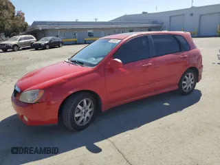 2005 Kia Spectra with VIN KNAFE162455069422, listed as a Copart auction lot 52999455 with 249,774 mi miles and Salvage Title. Bid and sale history available at carsss.com. Image 1.