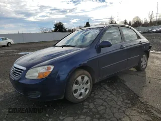 2007 Kia Spectra EX with VIN KNAFE122275488863, listed as a Copart auction lot 84555874 with 123,633 mi miles and Salvage Title. Bid and sale history available at carsss.com. Image 1.