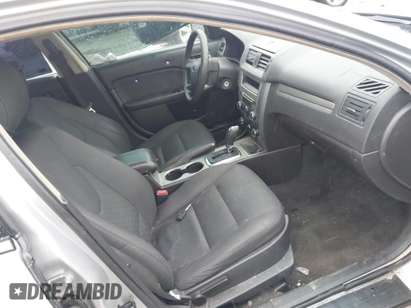 2012 Ford Fusion SE with VIN 3FAHP0HA9CR164546, listed as a IAAI auction lot 42016566 with 185,251 mi miles. Bid and sale history available at carsss.com. Image 5.