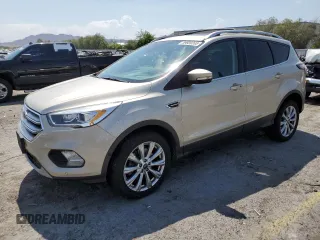 2018 Ford Escape Titanium с VIN 1FMCU9J91JUB44813, выставлен на аукционе Copart как лот 59920265 с пробегом 63 008 миль миль и Списание • Salvage title. История ставок и продаж доступна на DreamBid. Изображение 1.