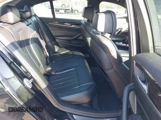 2018 BMW 5 Series M550i xDrive with VIN WBAJB9C55JB049529, listed as a IAAI auction lot 41241917 with 116,265 mi miles and . Bid and sale history available at carsss.com. Image 8.