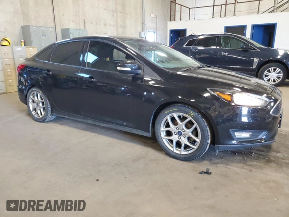 2015 Ford Focus SE with VIN 1FADP3F26FL385522, listed as a Copart auction lot 57963245 with 82,794 mi miles and Salvage title. Bid and sale history available at DreamBid. Image 4.
