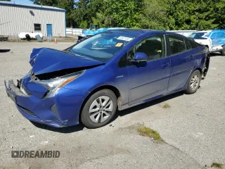 2018 Toyota Prius Two z VIN JTDKBRFU1J3599444, wystawiony jako Copart lot #55801485 z przebiegiem Nie podano mil oraz Szkoda całkowita • Salvage title. Historia ofert i sprzedaży dostępna na DreamBid. Obrazek 1.