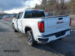 2021 GMC Sierra 1500 AT4 with VIN 3GTP9EEL1MG405564, listed as a IAAI auction lot 41214073 with 49,114 mi miles. Bid and sale history available at carsss.com. Image 3.