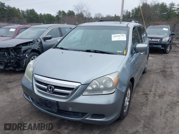 2007 Honda Odyssey EX-L with VIN 5FNRL38617B038017, listed as a IAAI auction lot 41840741 with 208,428 mi miles and . Bid and sale history available at carsss.com. Image 6.