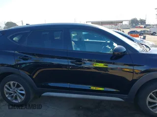 2018 Hyundai Tucson SEL z VIN KM8J33A43JU790981, wystawiony jako IAAI lot #42222023 z przebiegiem 63 924 mil mil oraz . Historia ofert i sprzedaży dostępna na DreamBid. Obrazek 13.