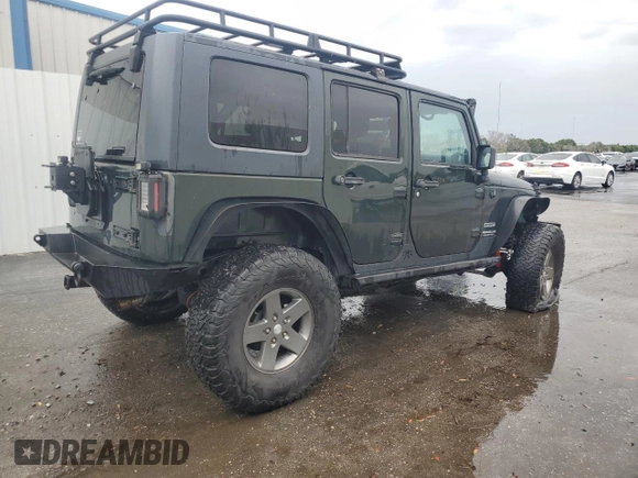 2012 Jeep Wrangler Unlimited Sport with VIN 1C4HJWDG8CL122067, listed as a Copart auction lot 58549805 with 124,658 mi miles and Clean title. Bid and sale history available at DreamBid. Image 3.