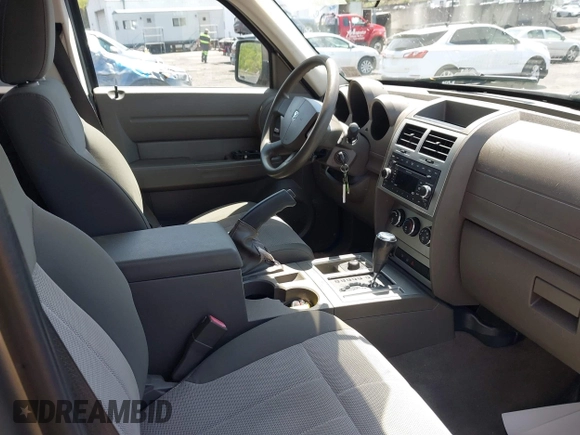 2007 Dodge Nitro SXT with VIN 1D8GU28K67W700764, listed as a IAAI auction lot 42244697 with 80,078 mi miles and . Bid and sale history available at DreamBid. Image 5.