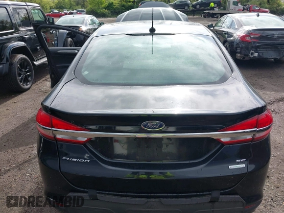 2017 Ford Fusion SE z VIN 3FA6P0HD4HR338676, wystawiony jako IAAI lot #42197370 z przebiegiem 50 862 mil mil oraz . Historia ofert i sprzedaży dostępna na DreamBid. Obrazek 16.