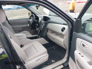2012 Honda Pilot EX-L with VIN 5FNYF4H57CB068021, listed as a IAAI auction lot 41909996 with 253,542 mi miles and . Bid and sale history available at carsss.com. Image 5.