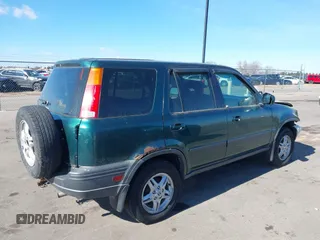 2000 Honda CR-V EX with VIN JHLRD176XYC035377, listed as a IAAI auction lot 41694054 with 196,985 mi miles. Bid and sale history available at carsss.com. Image 4.