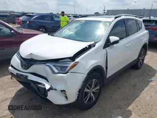 2017 Toyota RAV4 XLE with VIN JTMWFREV8HJ118885, listed as a IAAI auction lot 42097180 with 122,481 mi miles. Bid and sale history available at carsss.com. Image 2.