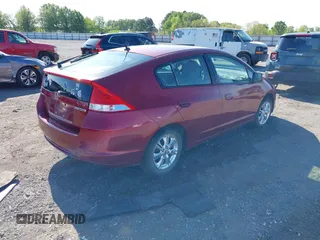 2010 Honda Insight EX z VIN JHMZE2H75AS033702, wystawiony jako IAAI lot #42027147 z przebiegiem 173 388 mil mil oraz . Historia ofert i sprzedaży dostępna na DreamBid. Obrazek 4.