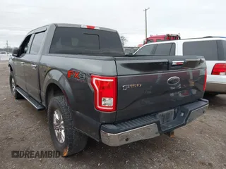 2015 Ford F-150 XLT with VIN 1FTEW1EG7FKE80275, listed as a IAAI auction lot 41721445 with 145,284 mi miles. Bid and sale history available at carsss.com. Image 3.