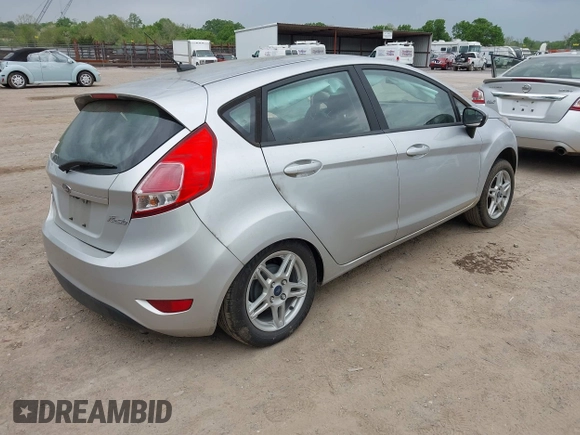 2019 Ford Fiesta SE with VIN 3FADP4EJ3KM145397, listed as a IAAI auction lot 42055399 with 80,667 mi miles. Bid and sale history available at carsss.com. Image 4.