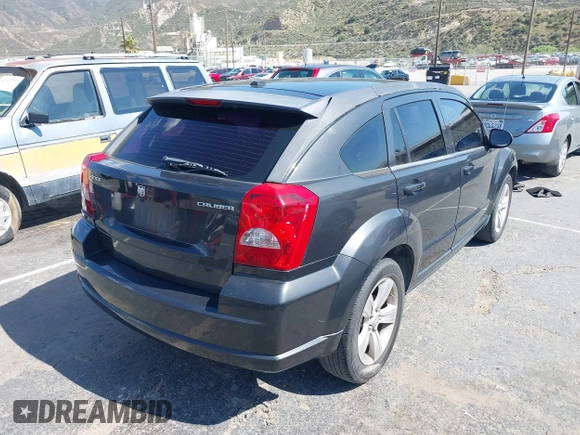 2011 Dodge Caliber Mainstreet with VIN 1B3CB3HA9BD120950, listed as a IAAI auction lot 42150354 with 103,015 mi miles. Bid and sale history available at carsss.com. Image 4.