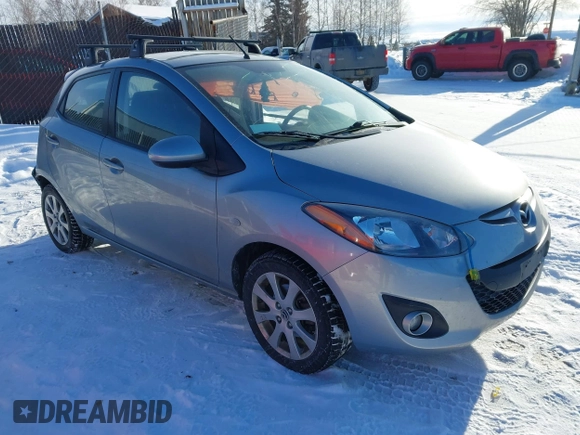 2013 Mazda 2 Touring z VIN JM1DE1LYXD0153291, wystawiony jako IAAI lot #41671574 z przebiegiem Nie podano mil oraz . Historia ofert i sprzedaży dostępna na DreamBid. Obrazek 1.