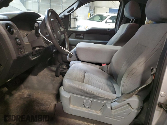 2014 Ford F-150 XL with VIN 1FTMF1EF8EFB92288, listed as a Copart auction lot 58770415 with 65,059 mi miles and Salvage title. Bid and sale history available at DreamBid. Image 7.