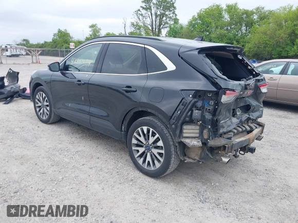 2020 Ford Escape Titanium with VIN 1FMCU9J97LUA35212, listed as a IAAI auction lot 42347274 with 50,419 mi miles and . Bid and sale history available at DreamBid. Image 3.
