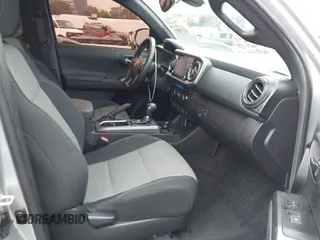 2022 Toyota Tacoma SR with VIN 3TYRZ5CN9NT022492, listed as a IAAI auction lot 42378801 with 9,312 mi miles and . Bid and sale history available at DreamBid. Image 5.