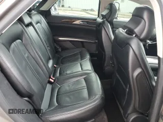 2015 Lincoln MKZ z VIN 3LN6L2G9XFR611837, wystawiony jako Copart lot #55038635 z przebiegiem 133 596 mil mil oraz Szkoda całkowita • Salvage title. Historia ofert i sprzedaży dostępna na DreamBid. Obrazek 10.