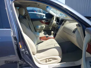 2009 Infiniti FX with VIN JNRAS18U69M102629, listed as a IAAI auction lot 42152789 with 188,718 mi miles. Bid and sale history available at carsss.com. Image 5.