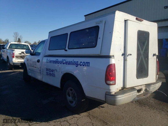 1999 Ford F-150 Work Series with VIN 1FTRF17W9XKB35000, listed as a Copart auction lot 86001964 with 155,055 mi miles and Salvage Title. Bid and sale history available at carsss.com. Image 2.