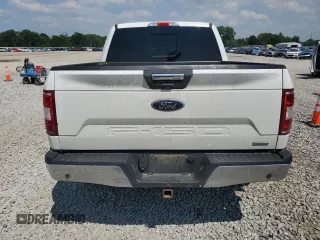 2018 Ford F-150 XL with VIN 1FTEW1EP0JFA28850, listed as a Copart auction lot 63585615 with 210,626 mi miles and Salvage title. Bid and sale history available at DreamBid. Image 6.