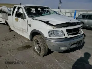 2002 Ford F-150 XL with VIN 1FTRX18L12NA01509, listed as a Copart auction lot 51098435 with Not provided miles and Salvage title. Bid and sale history available at DreamBid. Image 11.