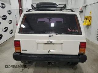 1996 Jeep Cherokee Sport with VIN 1J4FJ68S5TL235927, listed as a Copart auction lot 68942174 with 238,619 mi miles and Clean Title. Bid and sale history available at carsss.com. Image 6.